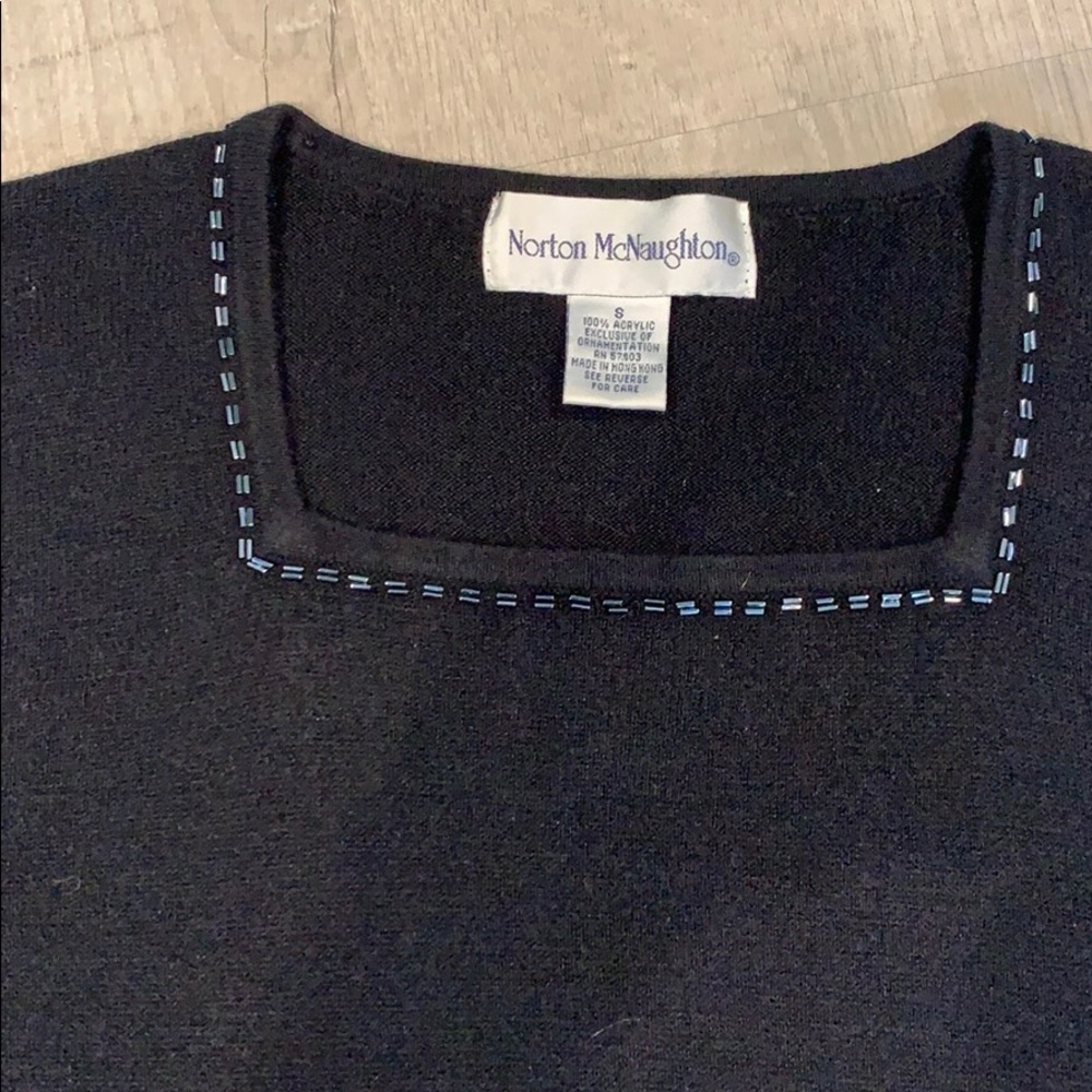 Super cute black sweater with beading